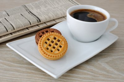 A Cup Of Coffee And Biscuits